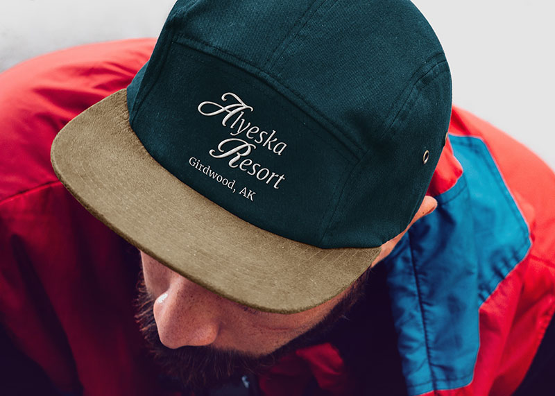 Man wearing a branded ballcap